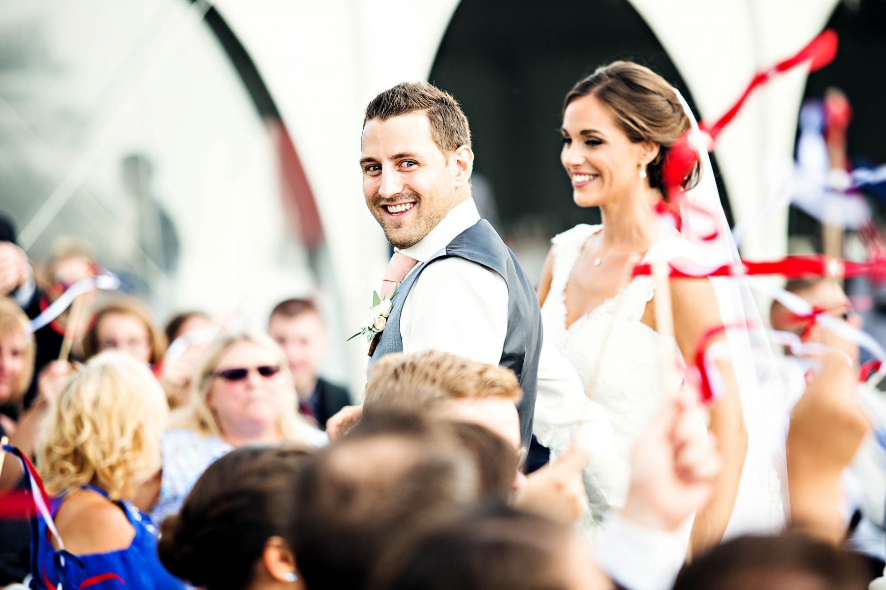 groom-smiling-at-guests